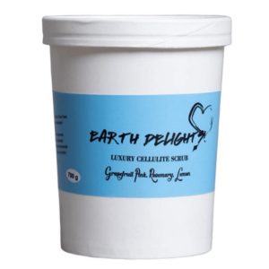 Handmade natural body scrub in a tub, showing a textured blend of exfoliating salts and botanical oils including grapefruit and rosemary.